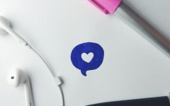 A doodle of a chat bubble with a heart.