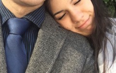 A girl resting her head on her guy friend's shoulder because he is so in the friend zone.