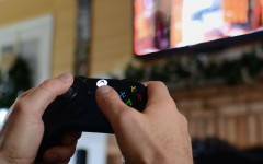 A man in a healthy relationship laying video games alone to get some time for himself.