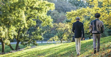 Two LGBT daters on a date in a park.