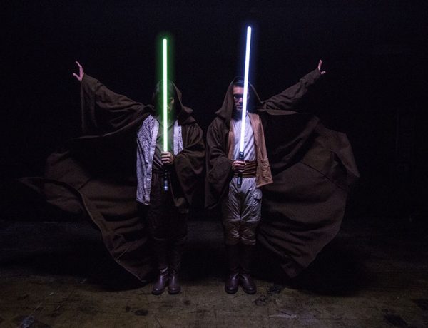 Two guys dressed like Jedis who are going to look for love on Star Wars dating sites.