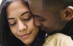 A man in his 30s dating and woman and trying to avoid common dating mistakes.