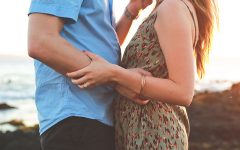 Two people using flirting body language to send the right signals.