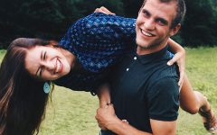 A girl who thought of cute boyfriend nicknames for her boyfriend laughing with him.
