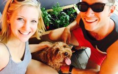 A couple with a dog