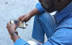 A guy having a conversation by asking online dating questions.