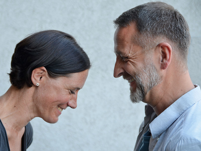 What men over 50 want in a woman is someone who can make him laugh like this woman with her date.