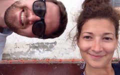 Two people who learned how to stay friends with an ex smiling together and being silly.