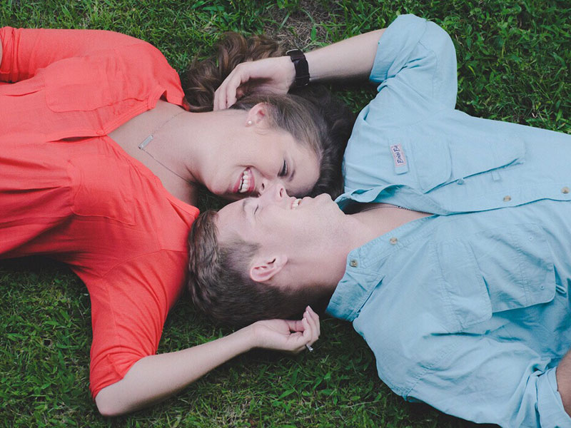 This woman laughing in the grass found out what 40-year-old men want in a woman... Her.