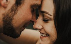 A man who figured out how to tell someone you love them about to kiss the woman he loves.