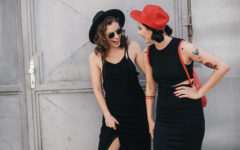 Two women who listened to these first date tips for modern daters laughing and talking on their date.