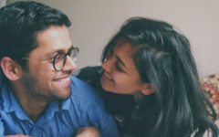 A woman who learned how to apologize to your boyfriend, laughing with her boyfriend after saying I'm sorry in the right way.