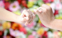 This couple learned what does a promise ring mean and are wearing their rings and 'holding fingers' to show how they feel.
