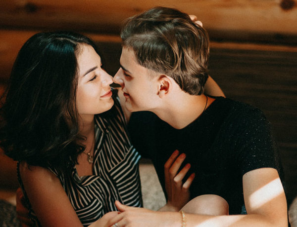 A girl who learned how to date in a small town about to kiss a guy on their first date.