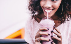 A woman showing one of these signs a woman likes you as she makes eye contact with the man she likes and smiles.