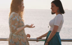 Two women having a serious conversation.