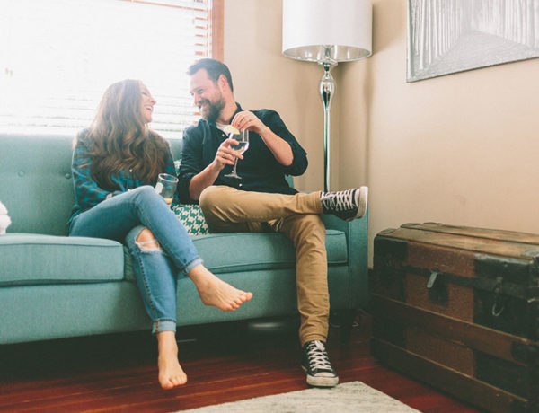 A woman talking to a man and putting out these nonverbal signs she likes you.