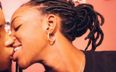 A woman who identifies as bi-curious, moving in to kiss another woman.