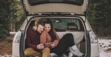 A man who listened to this first date tips, making his date laugh as they sit in the trunk of his car.