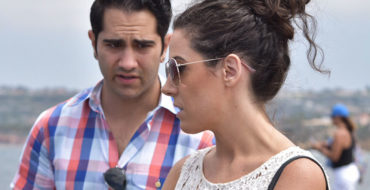 A guy and a girl fighting a bit on a bad first date.