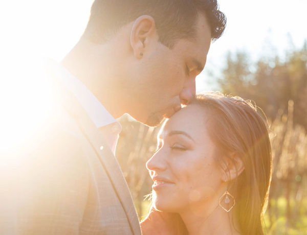 A guy who learned how to get a girl to you like you, kissing the head of the girl he's really into.