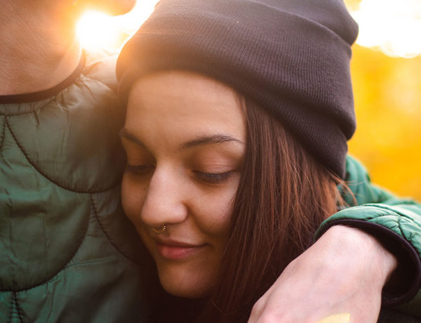 A girl thinking "I miss my boyfriend too much" while her boyfriend has his arm around her.