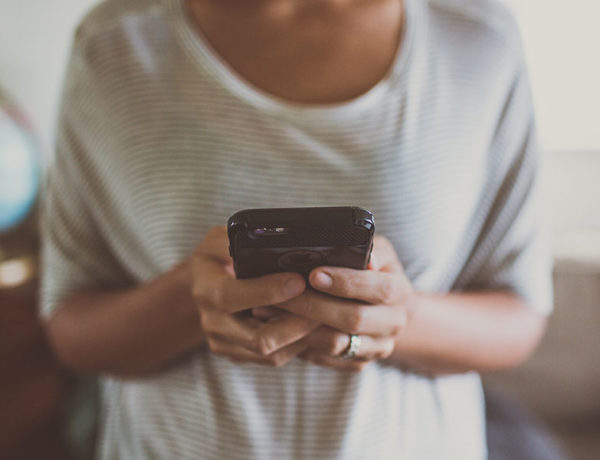 A woman on a dating app who's been ghosting trying to text a guy who's not responding.