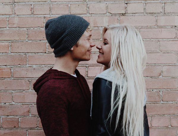 A guy who's looking for signs your ex will eventually come back looking into the eyes of her ex while they hug outside.