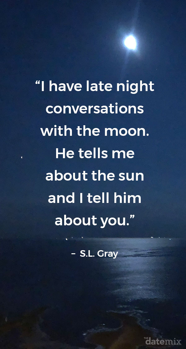 The ocean at night with the moon hanging bright above it with the long distance love quote below written out in the sky.