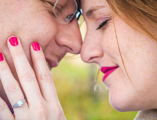 A couple who practices selfless love leaning against each other's foreheads with their eyes closed in a caress.
