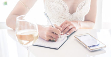 A woman writing one of these love letters for him while drinking a class of wine in the sun.