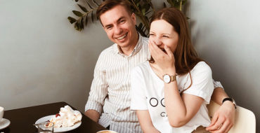 A couple who's thinking about becoming exclusive having dinner together.