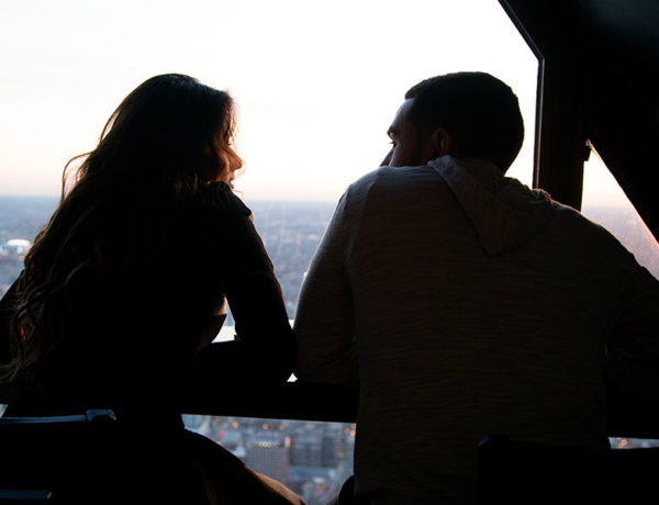 A divorced man telling his date that he was married before over drinks.