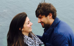 A man dating a divorcee, looking into the eyes of the woman he's on a date with while they're on a boat.