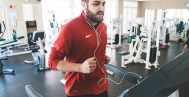 Man runs on treadmill to get in shape, because he's tired of being single.