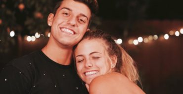 A guy and girl are together smiling. She likes him more than a friend.