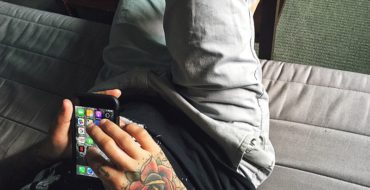 Man finding out how Bumble works on his smartphone