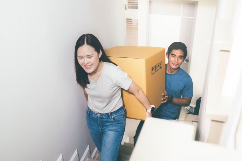 happy couple moving in together