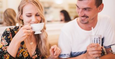 Attractive couple enjoying a fun first date conversation