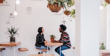 Attractive couple chatting about questions to ask on a first date